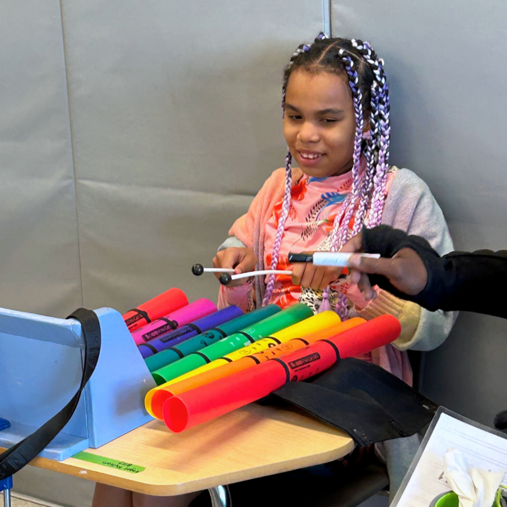 Bancroft student playing a musical instrument